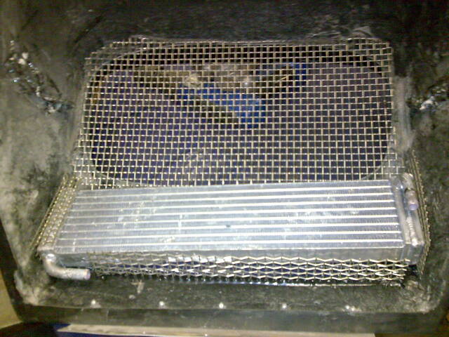 Charge cooler in grille